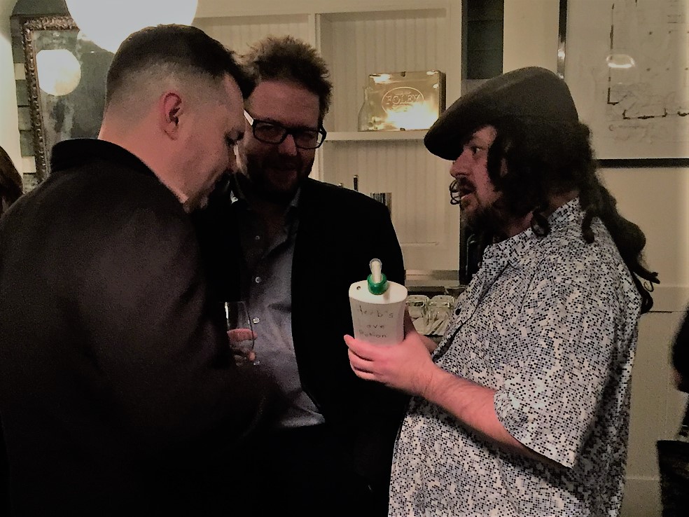 Resort to Murder - Herb, selling his "love potion lotion"