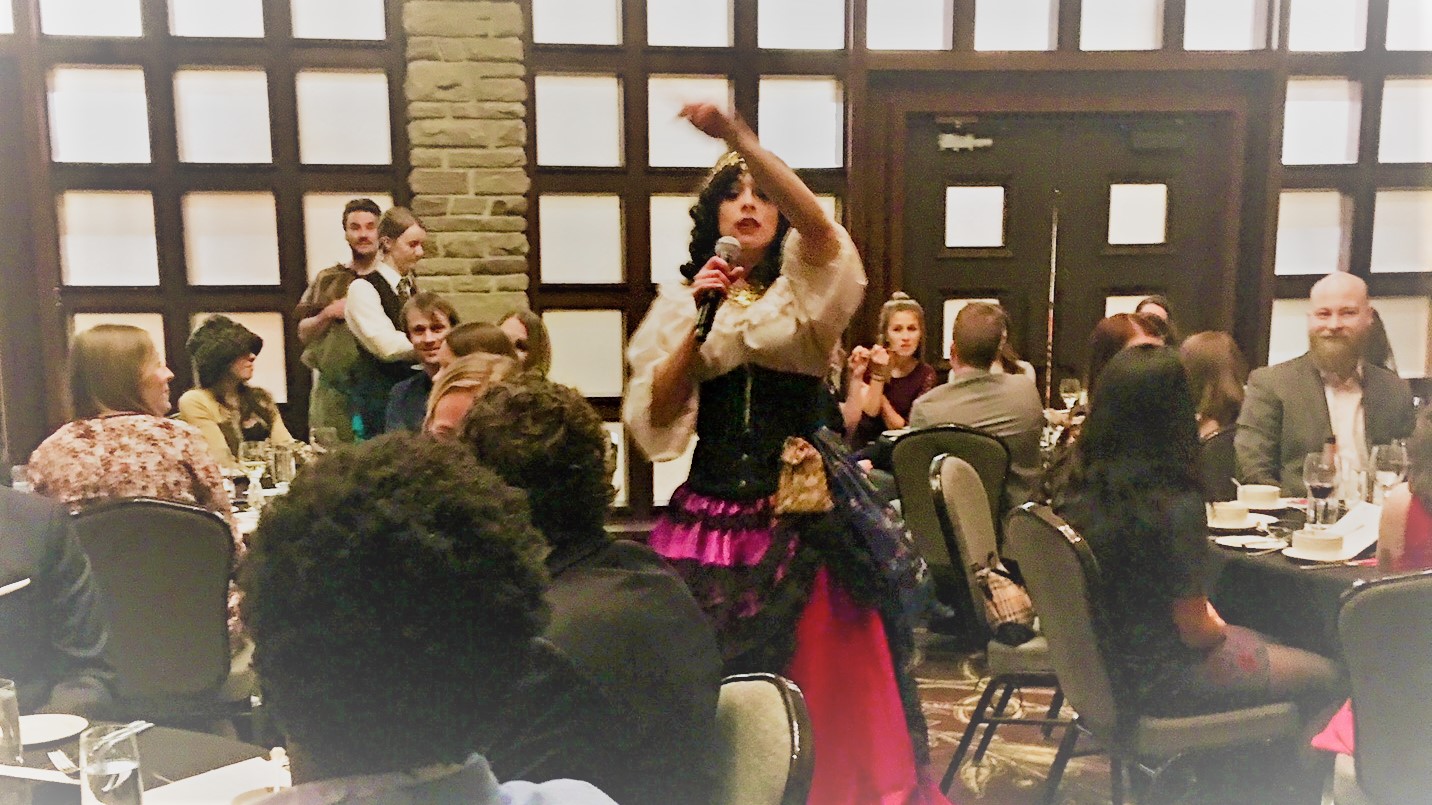 Resort to Murder - Karma entrances the crowd with her Fortune telling skills!