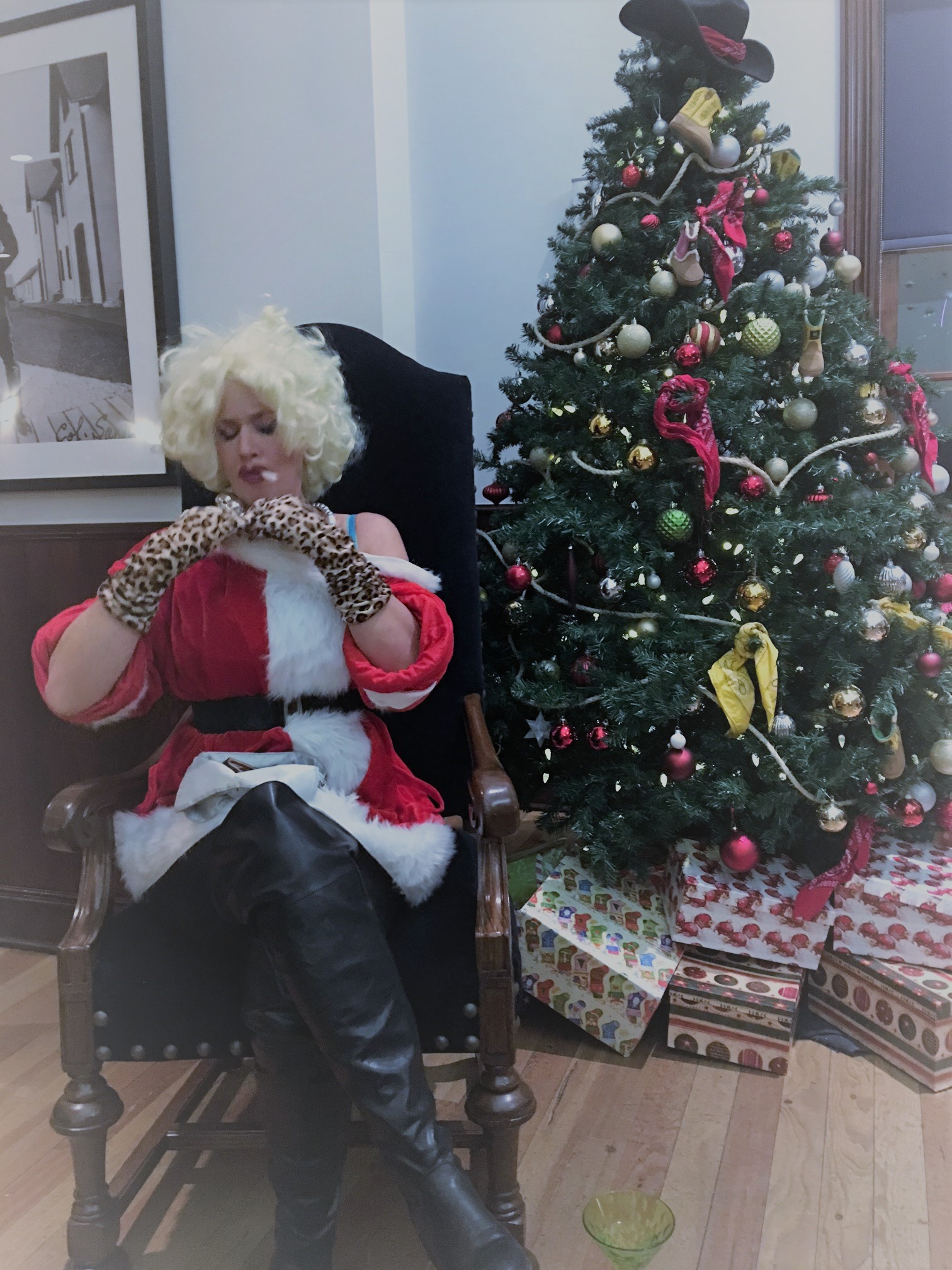 Murder at Mistletoe Mall - Mrs. "Claws" adjusts her cleavage on Santa's Throne